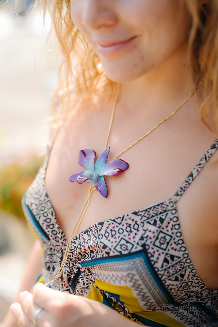 Model Wearing Wholesale Purple Orchid Flower Necklace Handmade in Thailand