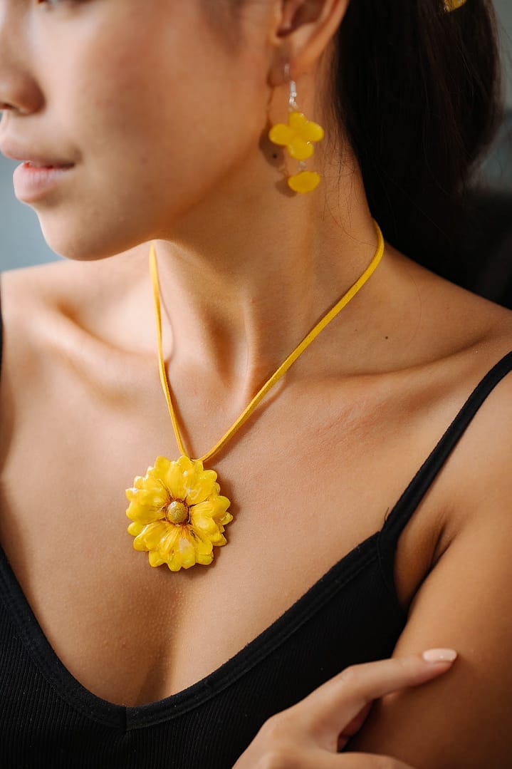 Model Wearing Wholesale Yellow Daisy Flower Necklace & Orchid Flower Earrings Handmade in Thailand