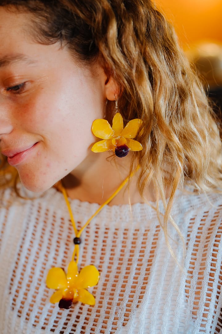 Model Wearing Wholesale Yellow Orchid Flower Earrings & Necklace Handmade in Thailand