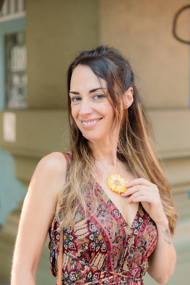 Model Wearing Wholesale Orange Daisy Flower Necklace Handmade in Thailand