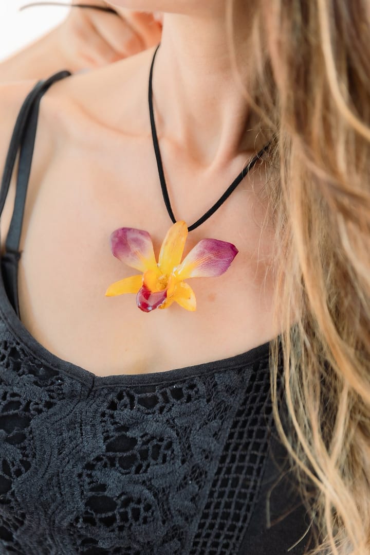 Model Wearing Wholesale Yellow Orchid Flower Necklace Handmade in Thailand